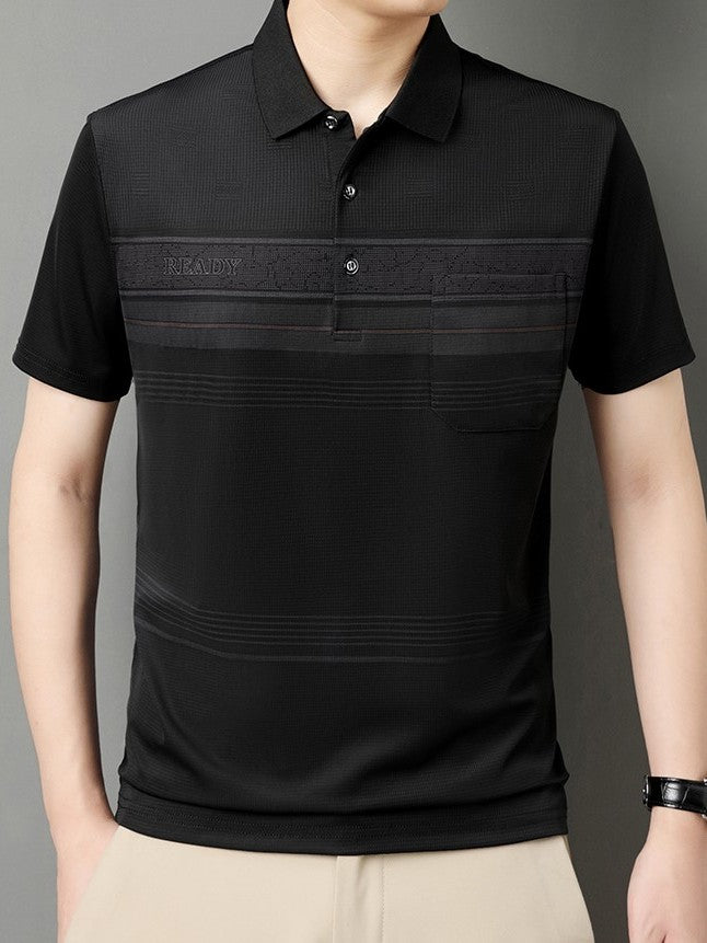 Black polo shirt with textured design on a gray background