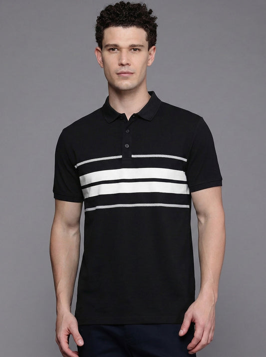 Man wearing a black polo shirt with white stripes on a gray background