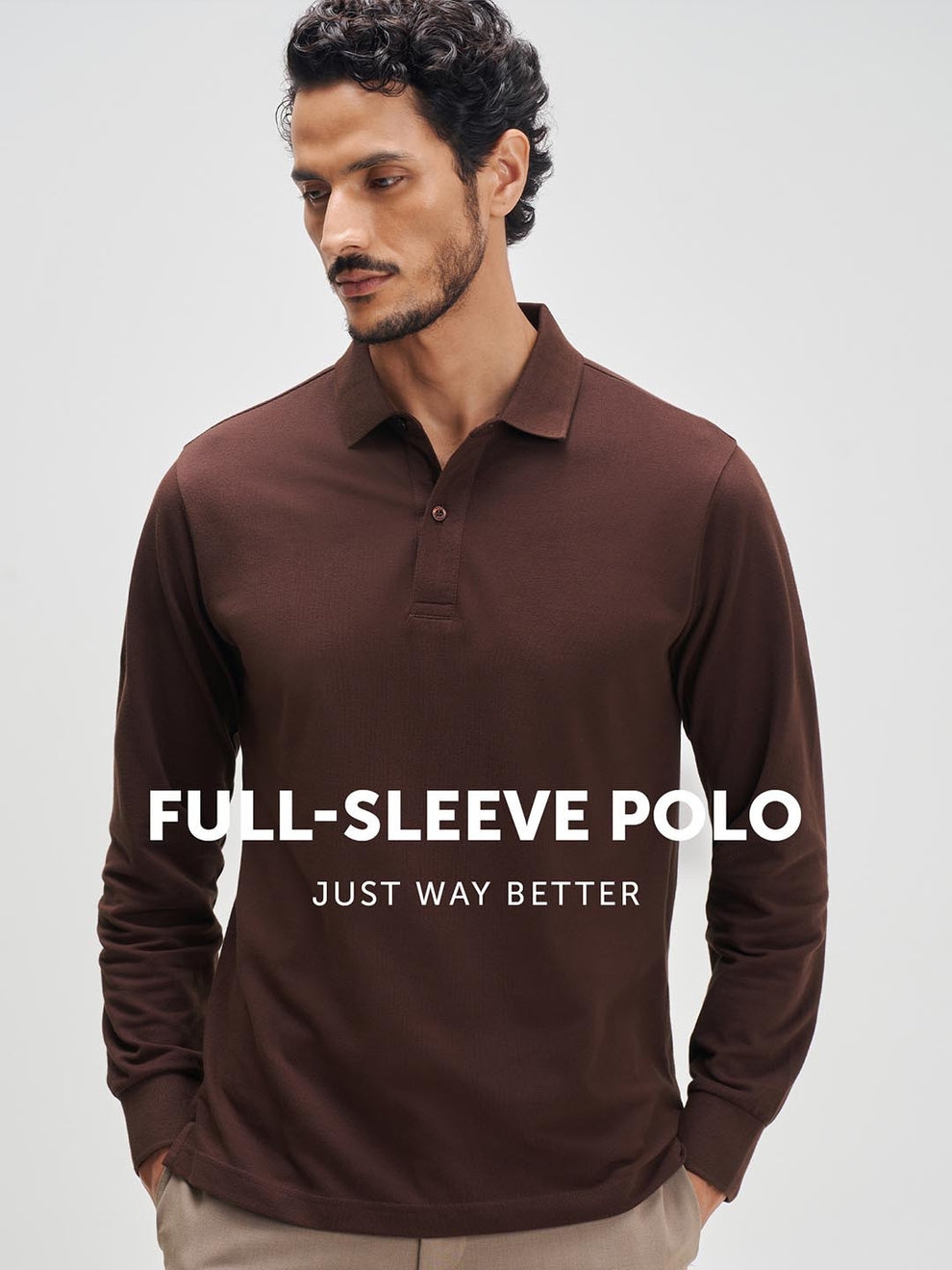 Man wearing a brown full-sleeve polo shirt on a light gray background