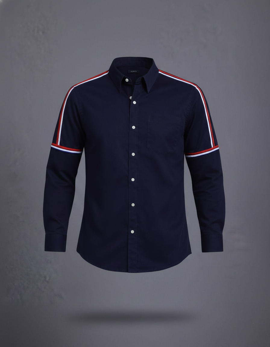 Navy shirt with red and white striped sleeves on a gray background