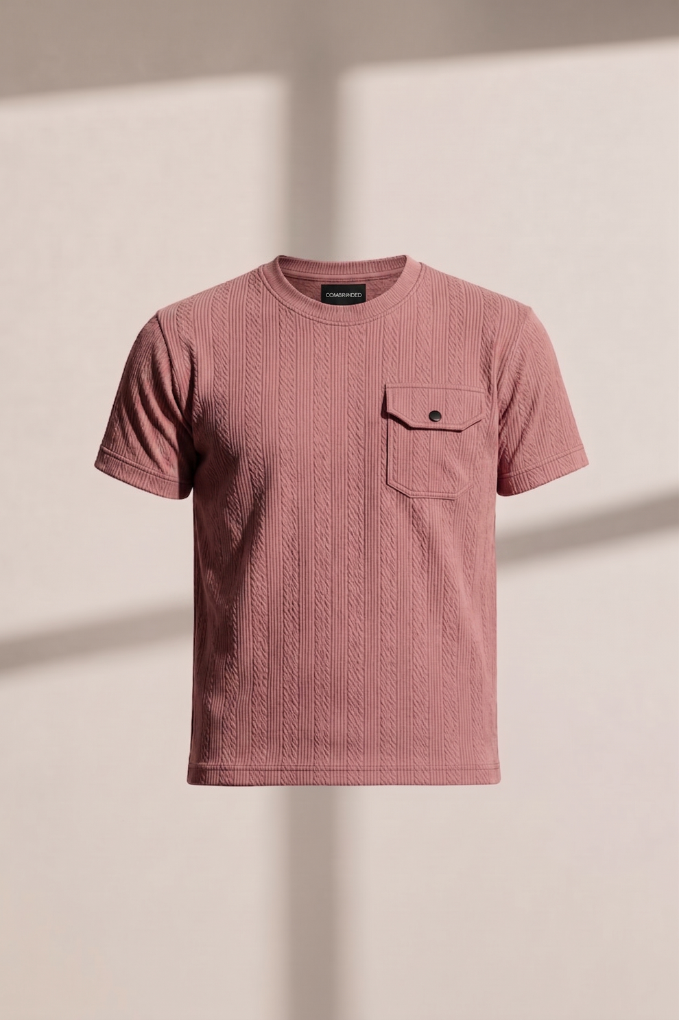Pink textured t-shirt with a pocket on a beige background
