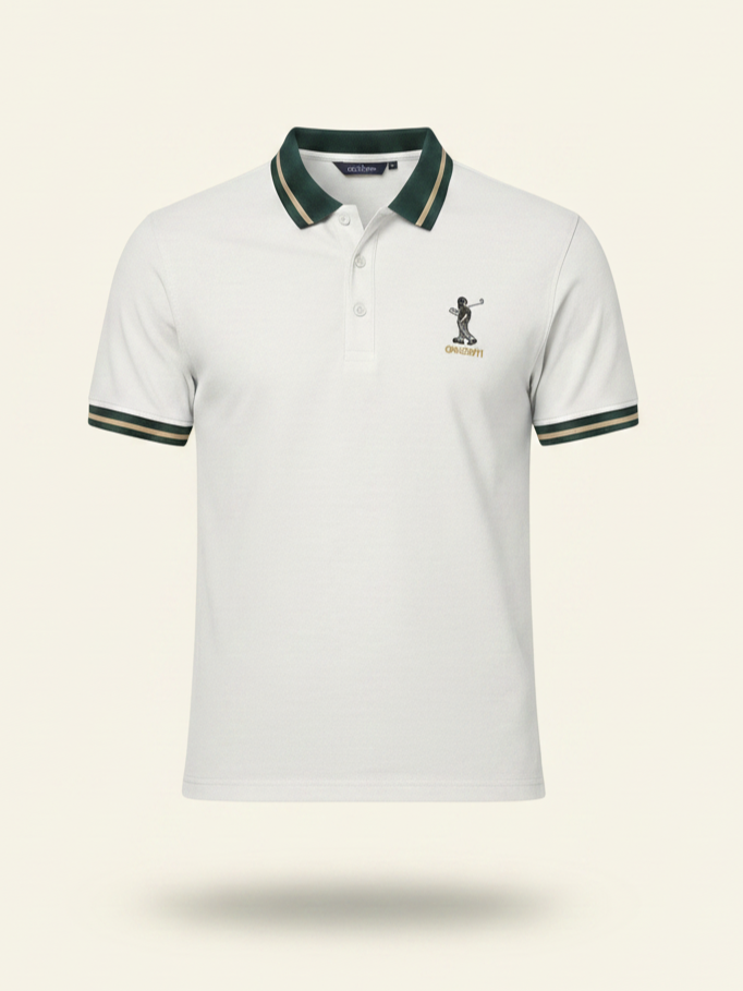 White polo shirt with green and yellow accents on a light beige background