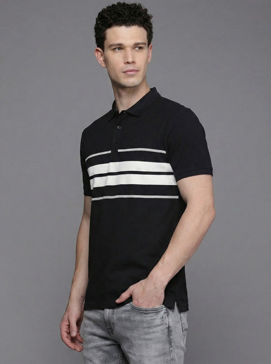 Man wearing a black polo shirt with white stripes on a gray background